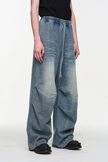 Washed Pleated Elastic Waist Jeans